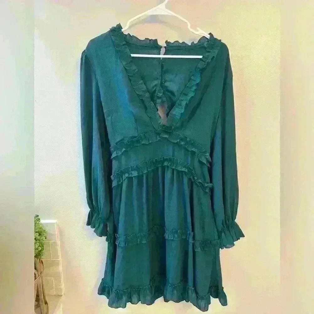 Green flowy ruffled  dress. Woman's medium